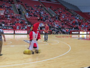 The cardinal rides a scooter